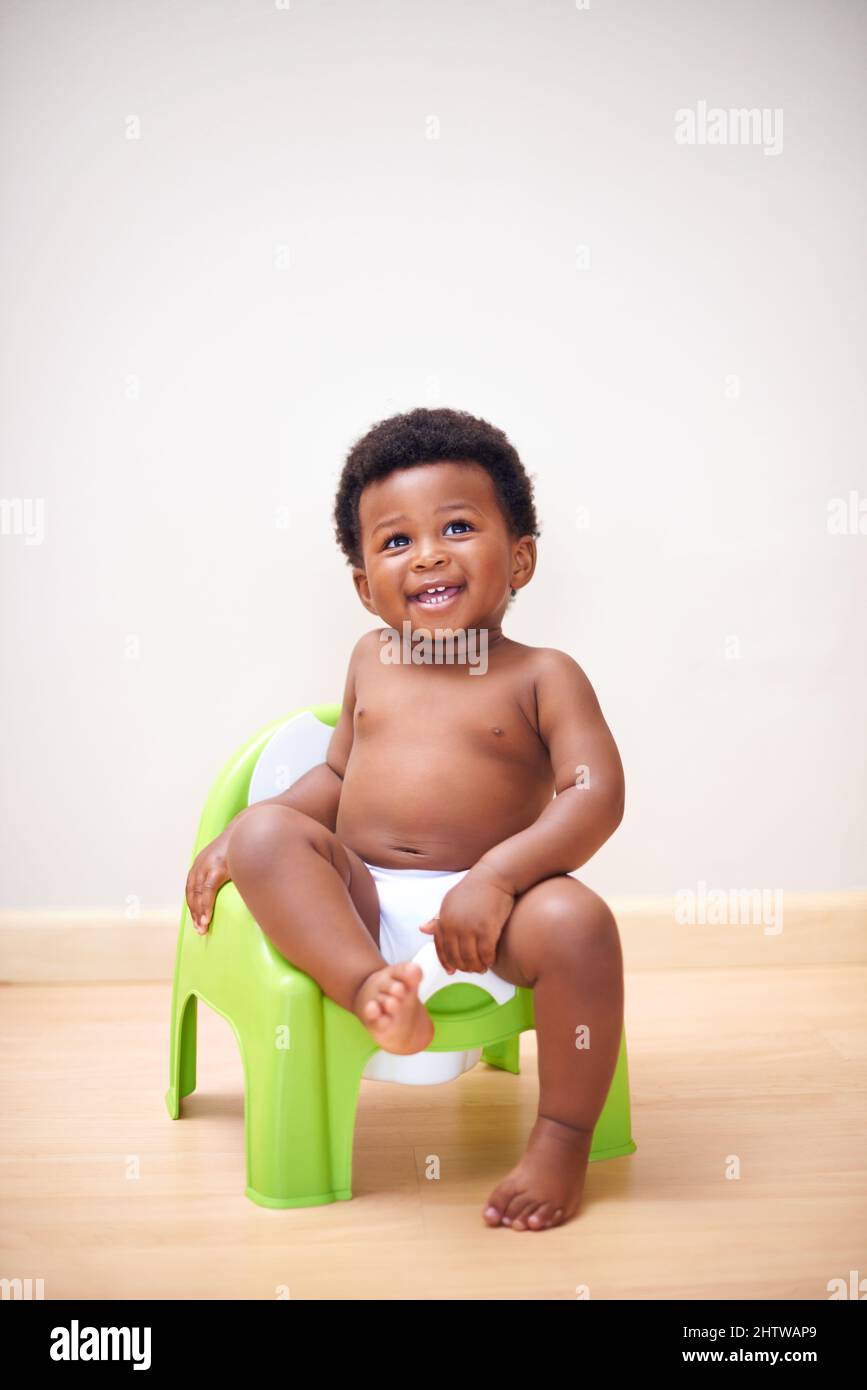 toilet training in a baby Baby toilet training stock photo
